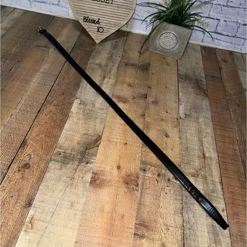 Black leather coach belt *has flaw